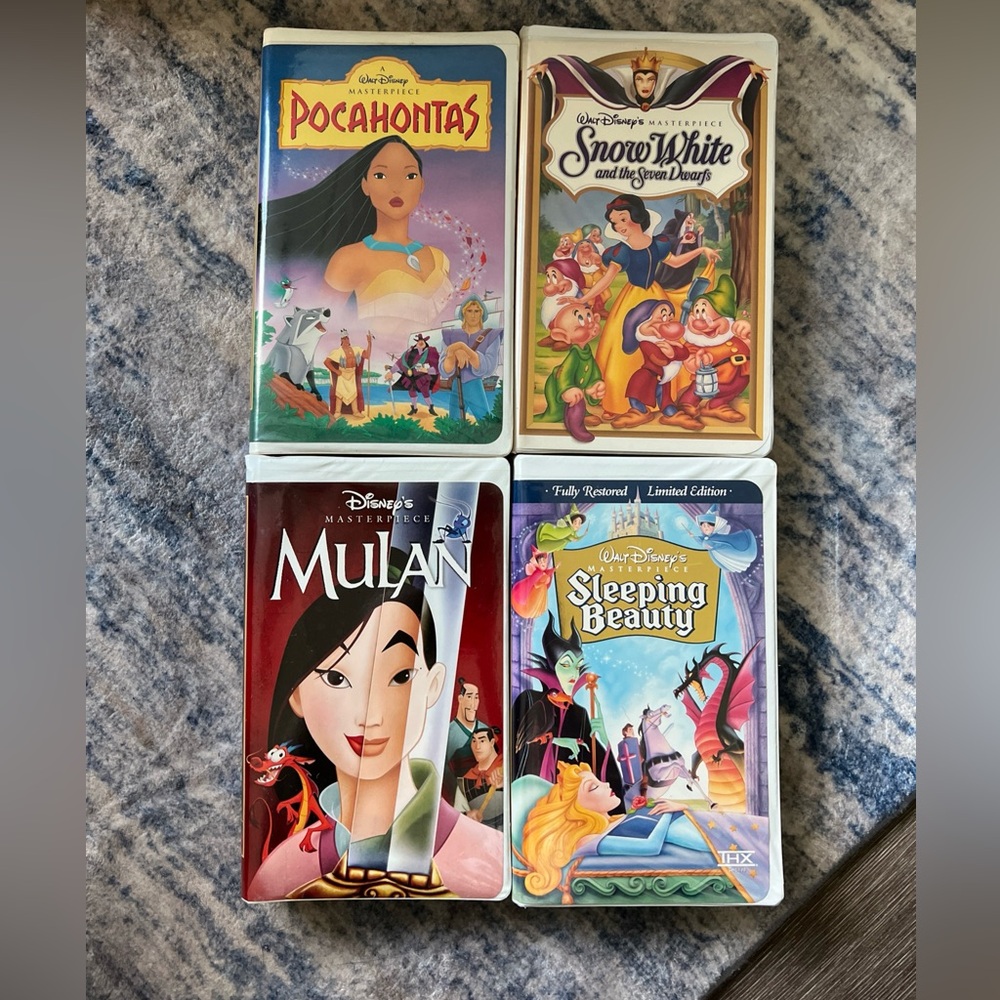 LOT of 4 Disney Movie VHS Clamshell Pocahontas Snow White Mulan Sleeping Beauty